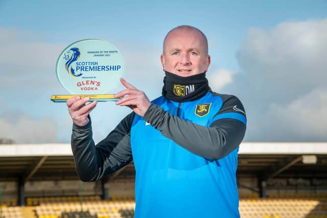 Livingston boss David Martindale with his January manager of the month award. Picture: Paul Chappells