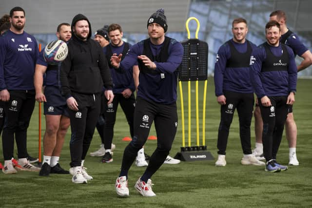 Jack Dempsey takes a pass during a Scotland training session.