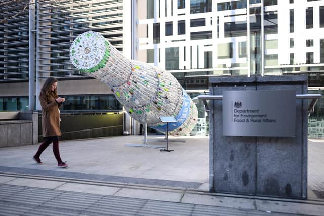 A sculpture made from over 2,500 plastic bottles recovered from beaches, rivers and streets from around the UK is seen outside the Department for Environment, Farming and Rural Affairs (DEFRA) as part of a stunt by environmental campaign group Greenpeace. Picture: Leon Neal/Getty Images