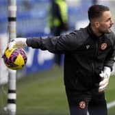 Mark Birighitti is back in Dundee United starting XI.
