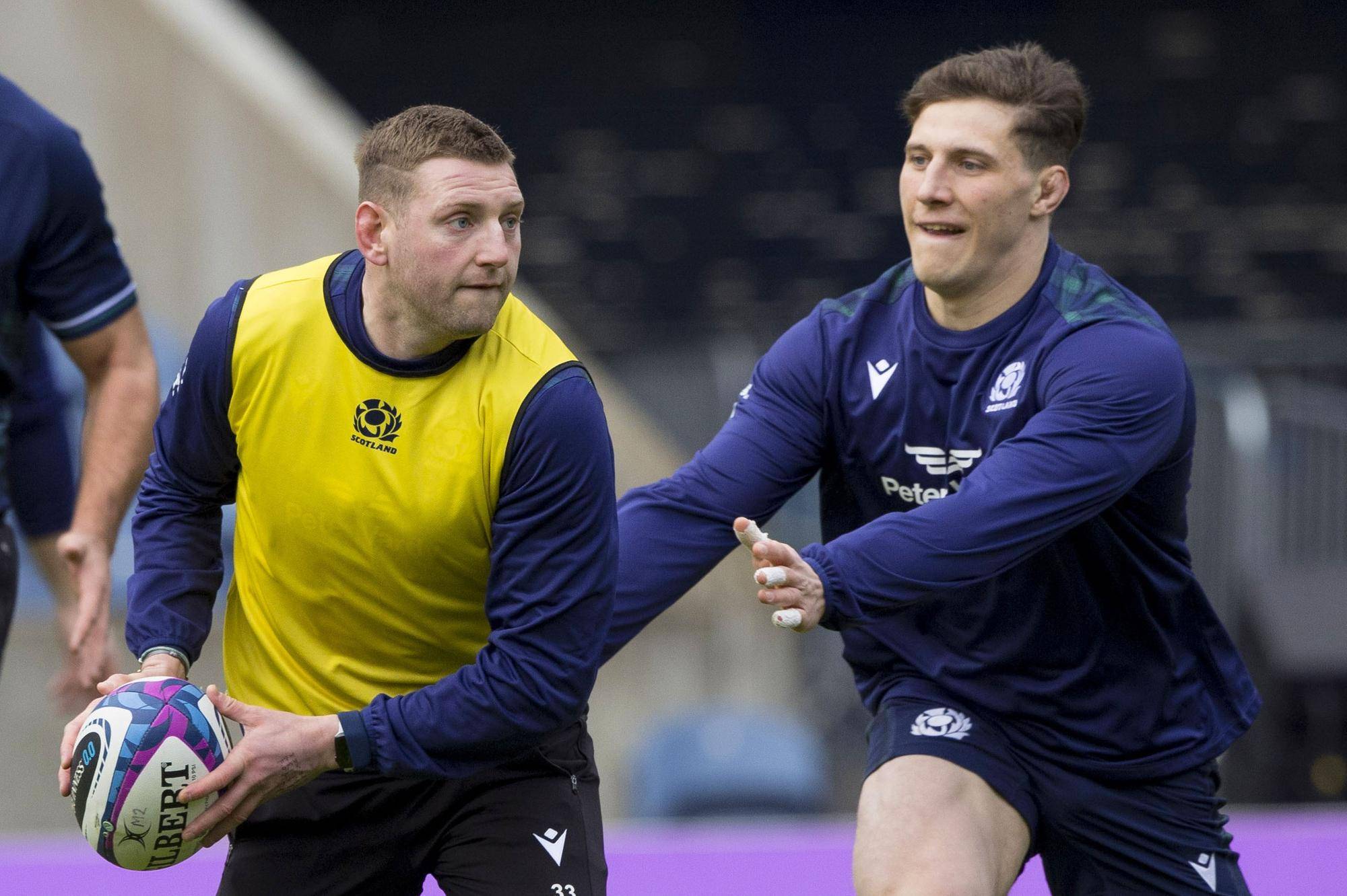 Scotland co-captains Finn Russell and Rory Darge during the team run at Murrayfield ahead of the Calcutta Cup clash against England. (Photo by Craig Williamson / SNS Group)