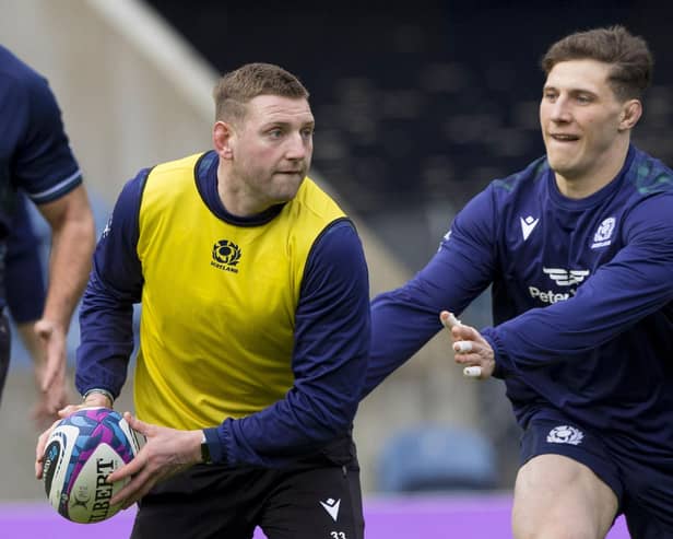 Scotland co-captains Finn Russell and Rory Darge during the team run at Murrayfield ahead of the Calcutta Cup clash against England. (Photo by Craig Williamson / SNS Group)