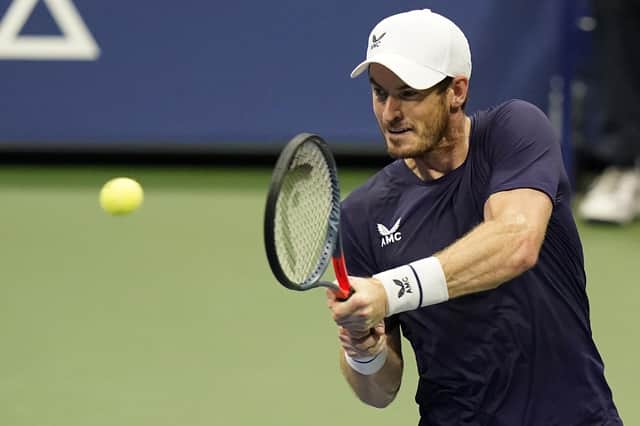 Andy Murray, of Great Britain, returns a shot to Felix Auger-Aliassime, of Canada, during the third round of the U.S. Open tennis championships, Thursday, Sept. 3, 2020, in New York. (AP Photo/Frank Franklin II)