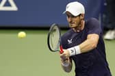 Andy Murray, of Great Britain, returns a shot to Felix Auger-Aliassime, of Canada, during the third round of the U.S. Open tennis championships, Thursday, Sept. 3, 2020, in New York. (AP Photo/Frank Franklin II)