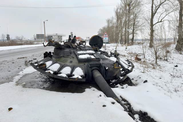 A destroyed Russian tank on the roadside near Kharkiv on February 26 was a sign of Ukraine's ability and determination to defend itself (Picture: Sergey Bobok/AFP via Getty Images)