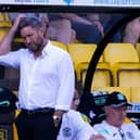 Lee Johnson was left scratching his head after Hibs' first-half performance at Livingston.