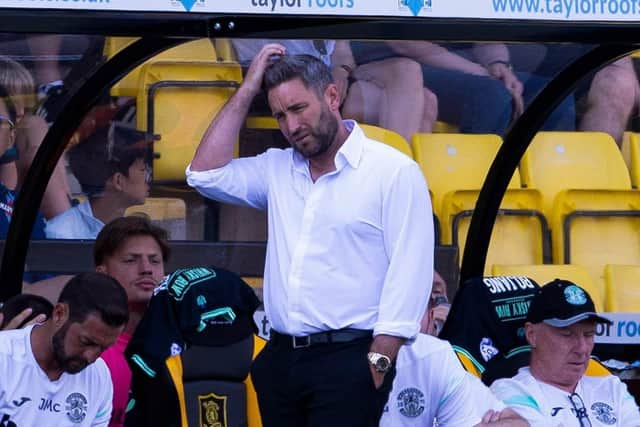 Lee Johnson was left scratching his head after Hibs' first-half performance at Livingston.