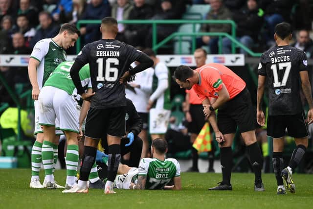 Martin Boyle goes down injured during Hibs' win over St Mirren.