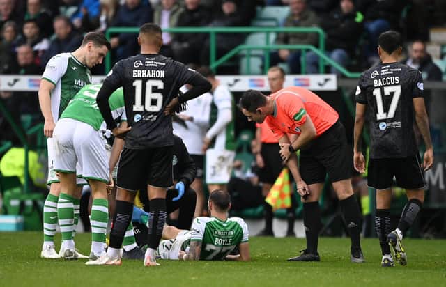 Martin Boyle goes down injured during Hibs' win over St Mirren.
