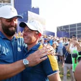 Rory McIlroy and Jon Rahm of Team Europe celebrate following Sunday's win in the 44th Ryder Cup at Marco Simone Golf & Country Club in Rome. Patrick Smith/Getty Images.