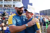 Rory McIlroy and Jon Rahm of Team Europe celebrate following Sunday's win in the 44th Ryder Cup at Marco Simone Golf & Country Club in Rome. Patrick Smith/Getty Images.