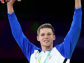 Duncan Scott celebrates with his 200m individual medlay gold medal at Birmingham 2022. (Photo by Mark Kolbe/Getty Images)