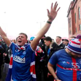 Rangers fans celebrate outside of the Ibrox Stadium after Rangers win the Scottish Premiership title. Picture date: Sunday March 7, 2021.