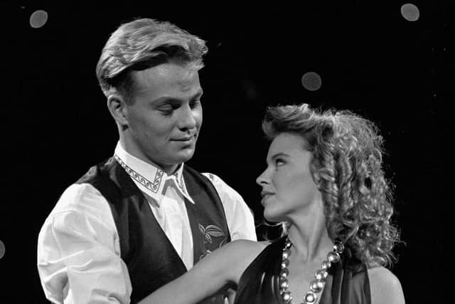 Neighbours stars turned pop singers Jason Donovan and Kylie Minogue rehearse at the Dominion Theatre, London, in 1989 (Picture: Malcolm Croft/PA)