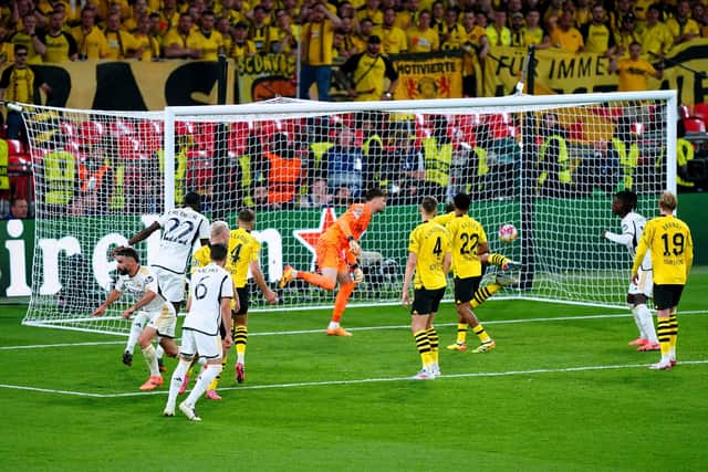 Real Madrid's Daniel Carvajal (left) celebrates scoring their side's first goal of the game at Wembley.