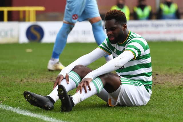 A frustrated Odsonne Edouard sits on the Tannadice pitch as Celtic draw with Dundee United. Picture: SNS
