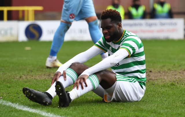 A frustrated Odsonne Edouard sits on the Tannadice pitch as Celtic draw with Dundee United. Picture: SNS