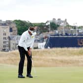 England's Ian Poulter putts on the 16th green during day one of The Open at the Old Course, St Andrews.