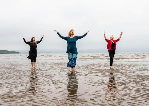 Performers Nerea Bello and  Mairi Morrison joined theatremaker Julia Taudevin on Silverknowes Beach to help launch this year's Made in Scotland showcase at the Fringe. (Picture: Lisa Ferguson)