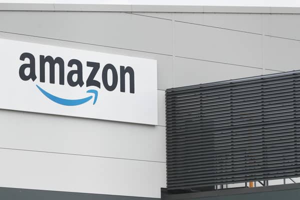 Hundreds of workers at online giant Amazon are to be balloted for strikes over pay.