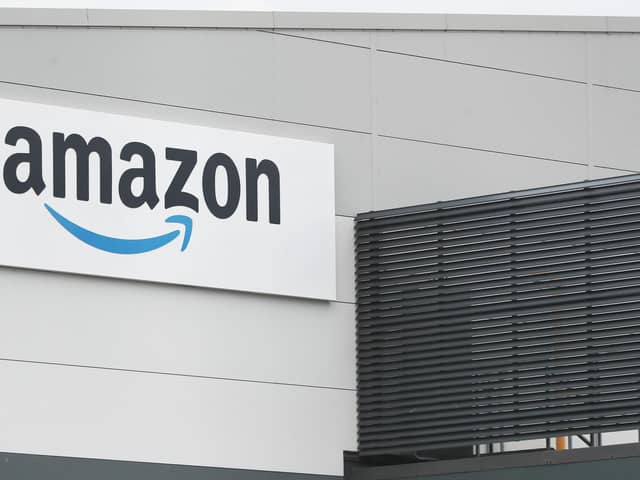 Hundreds of workers at online giant Amazon are to be balloted for strikes over pay.