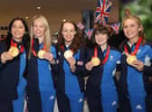 Great Britain curling Gold medalists Eve Muirhead (L) has received an OBE while team-mates Vicky Wright, Jennifer Dodds, Hailey Duff and Mili Smith were all recognised with an MBE
Pic: Steve Welsh