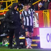 Eamonn Brophy comes off injured during a cinch Premiership match between Aberdeen and St Mirren.