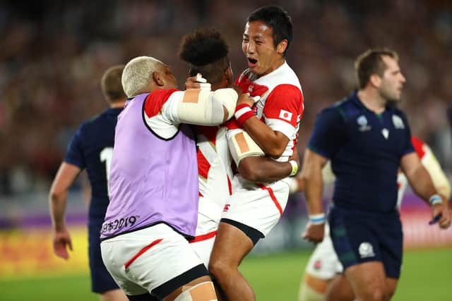 Japan celebrate their 28-21 win over Scotland at the 2019 Rugby World Cup. (Photo by Stu Forster/Getty Images)