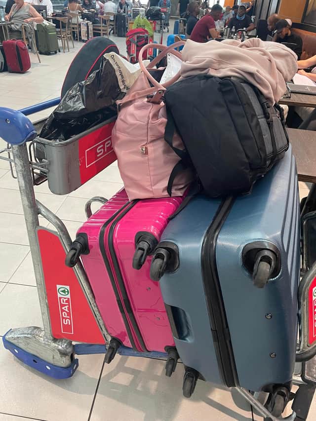 The couple's bags at the airport as they try and book a flight back home to Edinburgh.