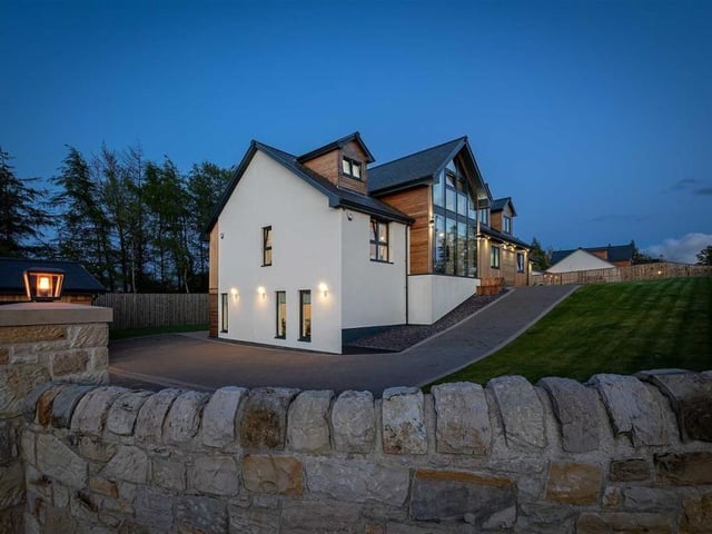 The house design makes clever use of the slope of the land.