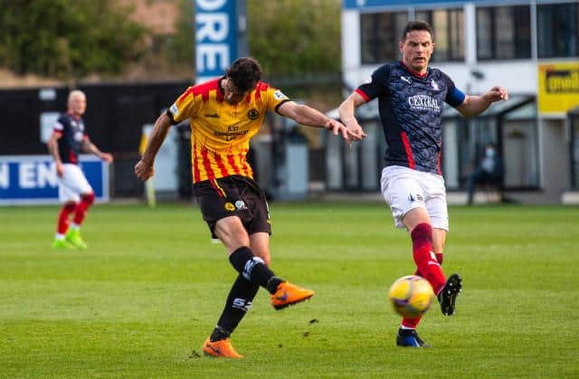 Brian Graham smashes home a stunning goal to put Partick Thistle 3-0 up against Falkirk. (Photo by Craig Foy / SNS Group)