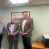 L-R:  David Beaton Managing Director for Highlands and Paul Fogg, Green Road Manager with Peter Knight Managing Director for Bluebird.