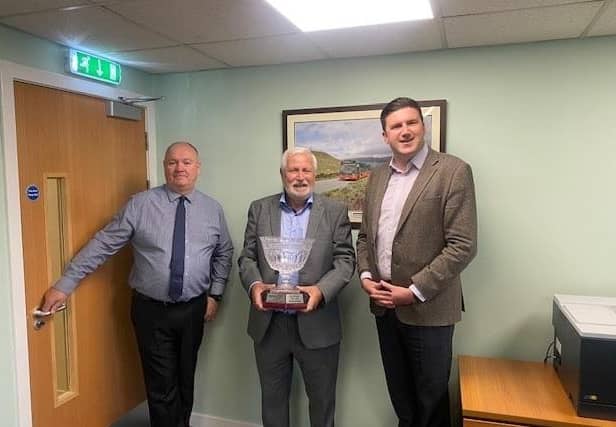 L-R:  David Beaton Managing Director for Highlands and Paul Fogg, Green Road Manager with Peter Knight Managing Director for Bluebird.
