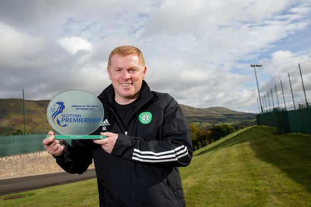 Celtic manager Neil Lennon with the manager of the month award for September