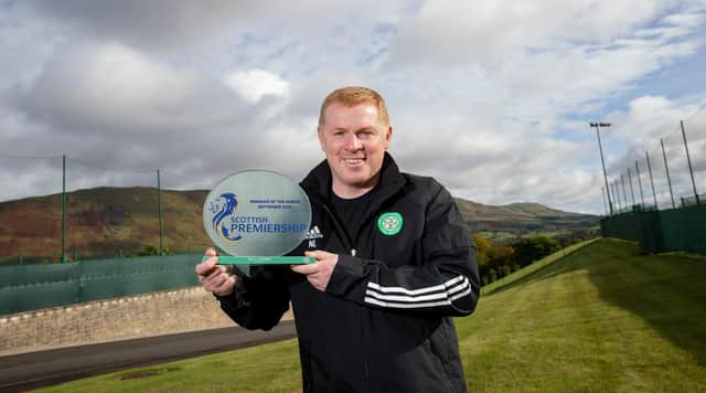 Celtic manager Neil Lennon with the manager of the month award for September