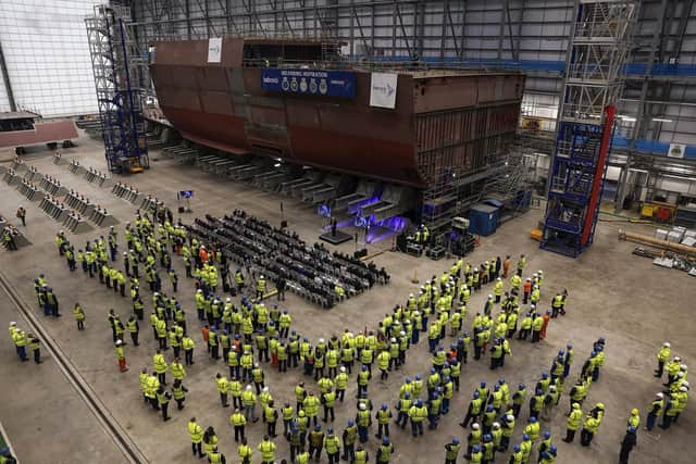 Guests and workers observe the progress on ship one being built at the Rosyth dockyards. Picture: Jeff J Mitchell/Getty Images