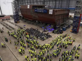 Guests and workers observe the progress on ship one being built at the Rosyth dockyards. Picture: Jeff J Mitchell/Getty Images