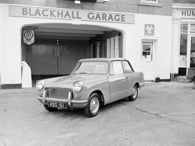 A new Triumph Herald outside the Blackhall Garage in 1961.