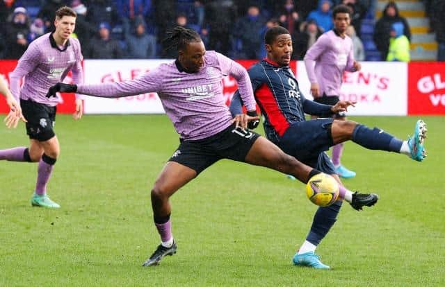 Rangers midfielder Jor Aribo battles for possession with Ross County's Kayne Ramsay during the 3-3 draw between the teams in Dingwall in January. (Photo by Craig Williamson / SNS Group)