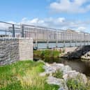 Works on the scheme – which is designed to protect homes and businesses which have previously been badly affected by flooding events around the River Carron – began in the Spring of 2019.