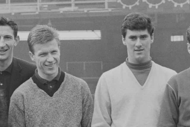 John White (left) hit the bar while Jim Baxter was also involved in an incident over a sponge in the 1961 defeat (Photo by Burgess/Daily Express/Hulton Archive/Getty Images)