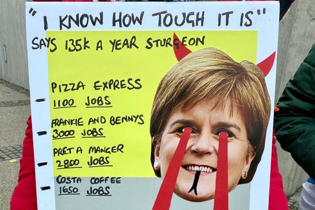 Some participants were seen holding placards detailing job losses seen throughout the pandemic and asking First Minister Nicola Sturgeon to resign.