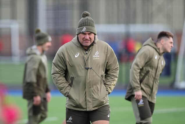 Australia coach Dave Rennie reacquaints himself with the Scottish weather during training at Edinburgh University's Peffermill playing fields. (Photo by Ian MacNicol/Getty Images)