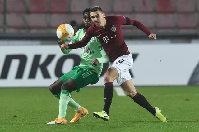 Celtic's scorer Odsonne Edouard , one of the few bright sport in the grim 4-1 defeat in Prague, is challenged by Sparta defender Dominik Plechaty (Photo by Michal Cizek / AFP) (Photo by MICHAL CIZEK/AFP via Getty Images)