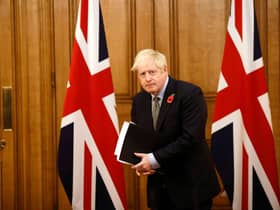 Boris Johnson's 'oven-ready' Brexit deal was as fictional as the infamous Brexit bus pledge about extra funding for the NHS, says Angus Robertson (Picture: Tolga Akmen/WPA pool/Getty Images)