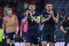 Scotland's Andy Robertson and John McGinn at full time after the 2-0 win over Georgia at Hampden in June. (Photo by Craig Williamson / SNS Group)