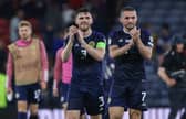 Scotland's Andy Robertson and John McGinn at full time after the 2-0 win over Georgia at Hampden in June. (Photo by Craig Williamson / SNS Group)
