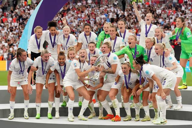 England's Leah Williamson and Millie Bright lift the trophy as England celebrate winning the UEFA Women's Euro 2022 final at Wembley Stadium, London. Picture date: Sunday July 31, 2022. PA Photo. See PA story SOCCER Euro 2022. Photo credit should read: Jonathan Brady/PA Wire.