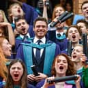 Richard Madden stands on the steps of the Royal Conservatoire of Scotland following receiving an honorary doctorate for his contribution to drama in 2019.