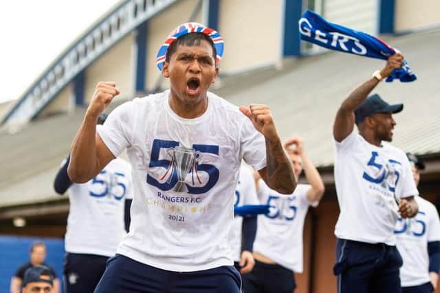 Alfredo Morelos celebrates outside the Rangers training ground on the day the Ibrox club clinched the Premiership title. (Photo by Ross MacDonald / SNS Group)